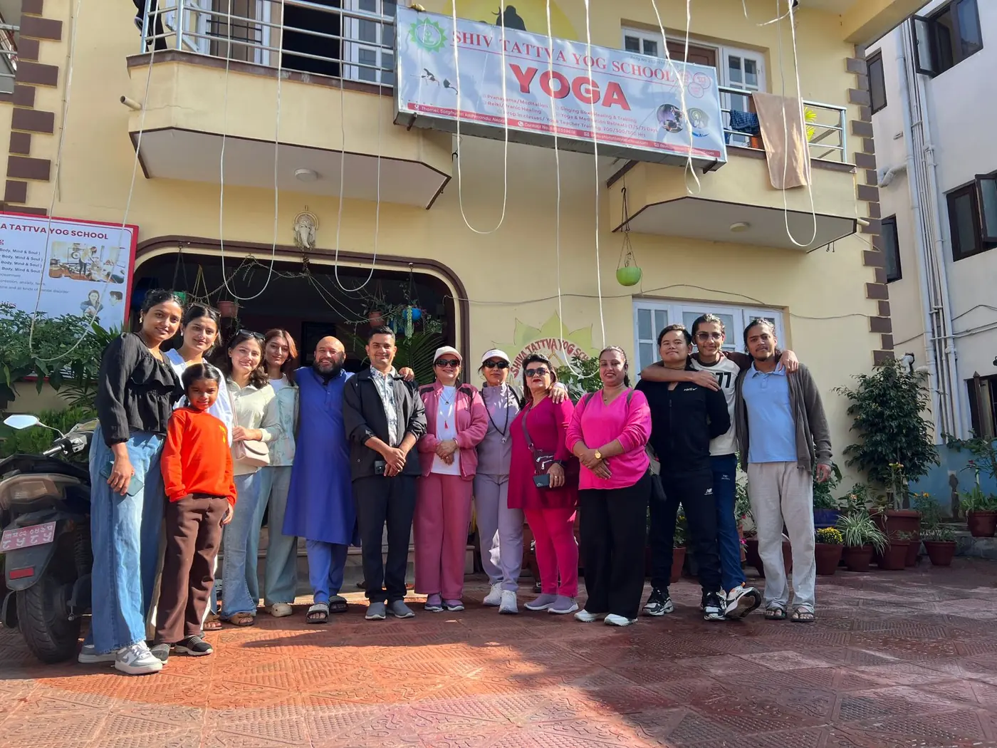 Students and teachers outside Shiv Tattva Yog School in Budhanilkantha
